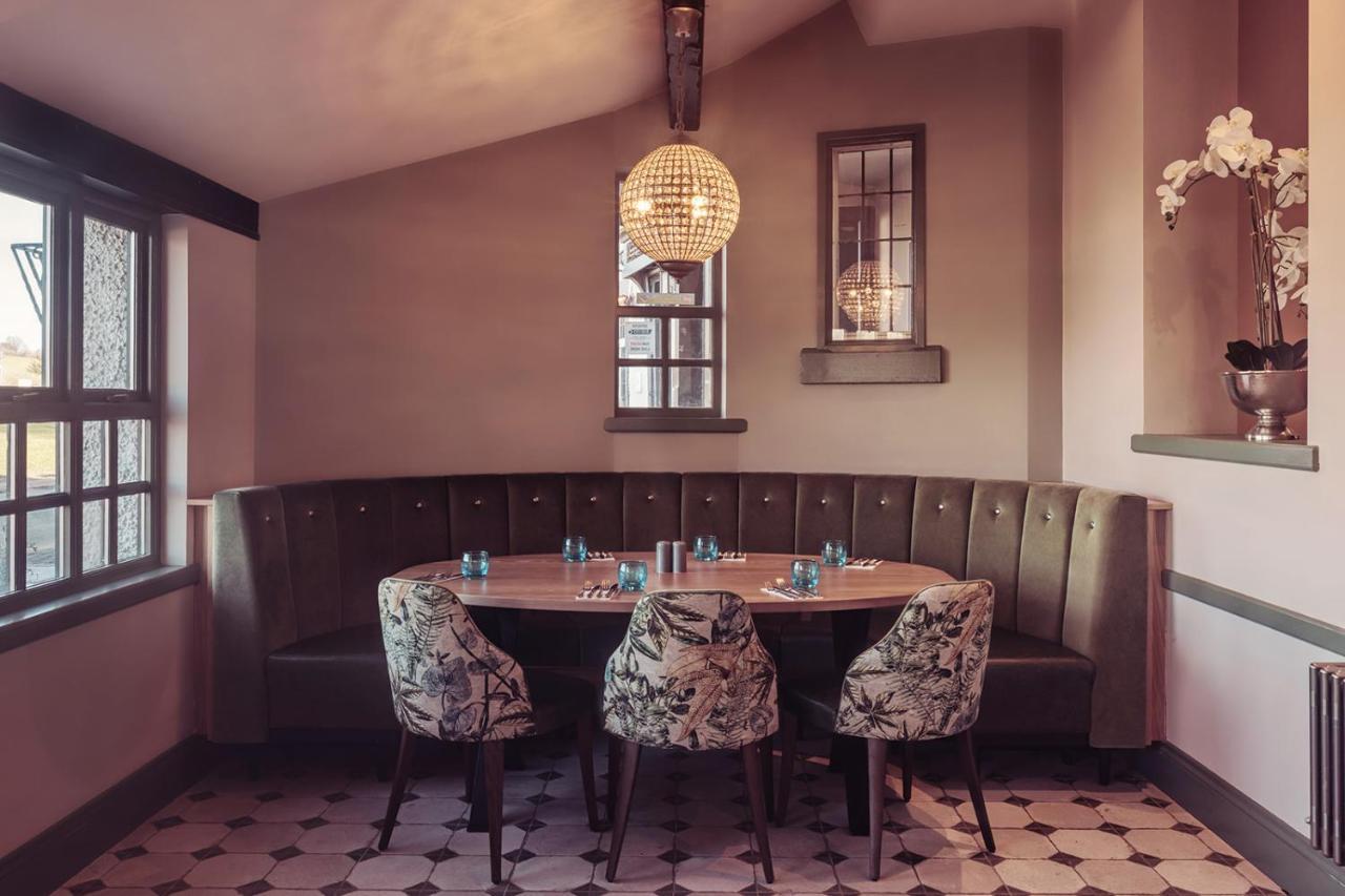 Longlands Inn & Cottages Carnforth Exterior foto The restaurant's interior