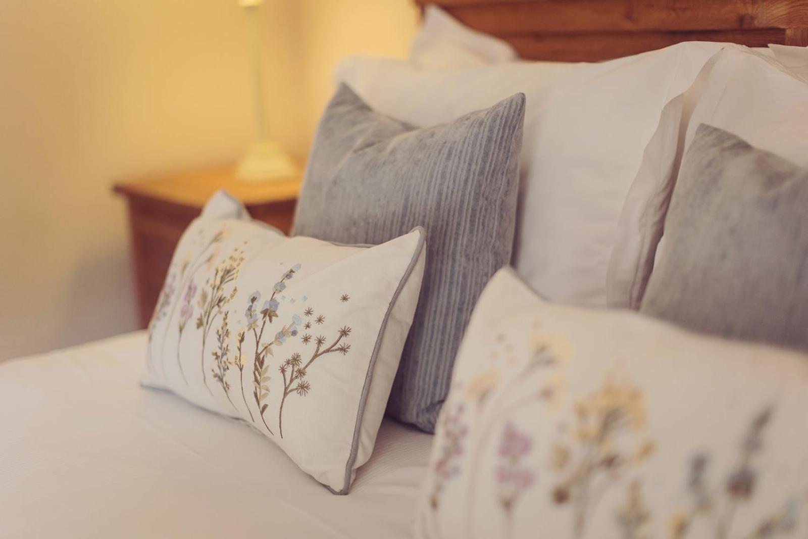 Longlands Inn & Cottages Carnforth Exterior foto Pillows on a bed